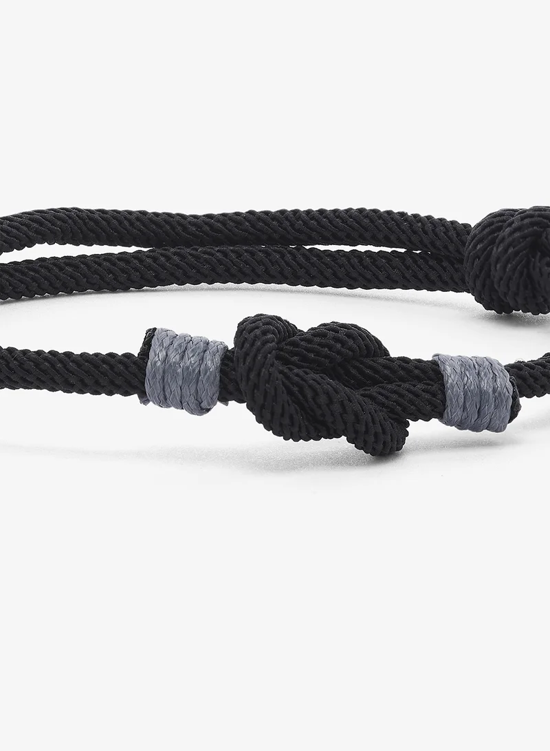 Seventy Five Cord Bracelet Featuring Central Knot Motif